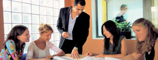 Small group intensive English courses in language school for professional